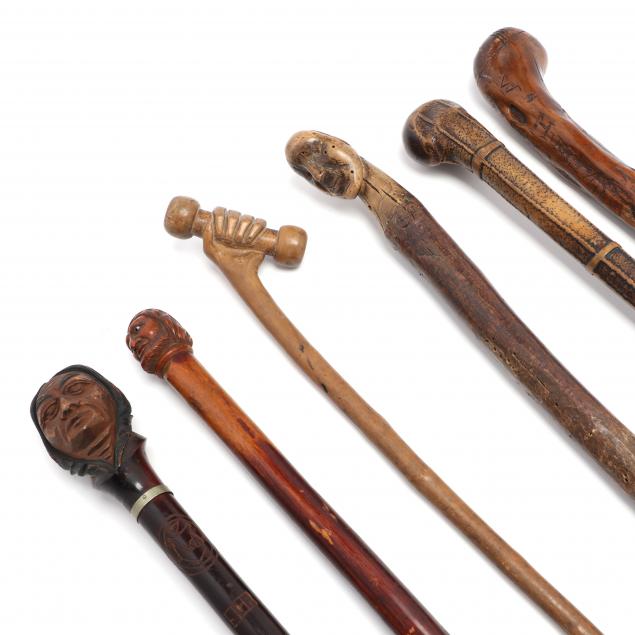 SIX CARVED FOLK ART WALKING STICKS