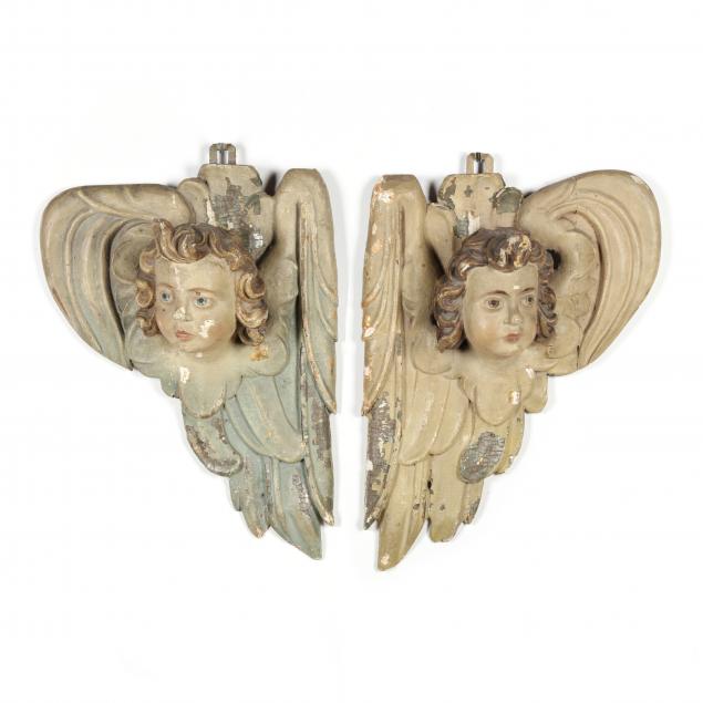 PAIR OF CARVED AND PAINTED PUTTI