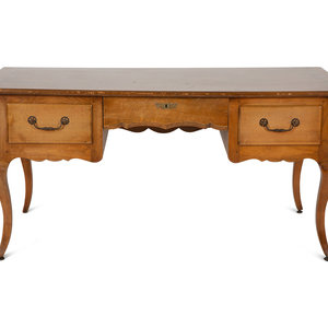 A Louis XV Provincial Style Fruitwood