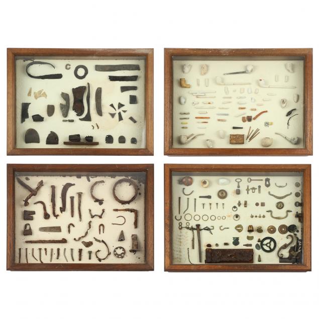 FOUR ARTIFACT DISPLAYS ILLUSTRATING