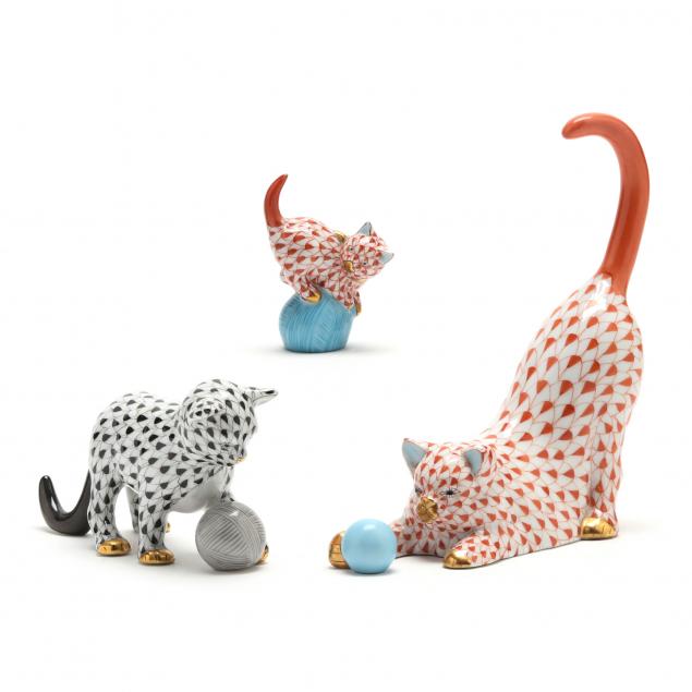 THREE HEREND CATS PLAYING WITH BALLS