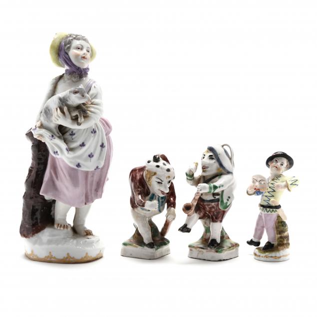 FOUR ANTIQUE PORCELAIN FIGURINES