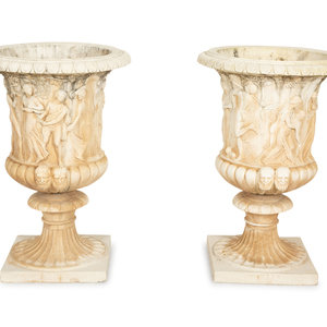 A Pair of Cast Stone Campana Urns
20th