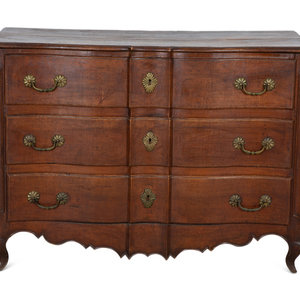 A French Provincial Carved Walnut