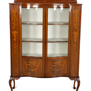 An Edwardian Mahogany and Marquetry