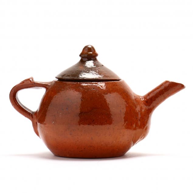 EARLY TEAPOT AND COVER, JUGTOWN