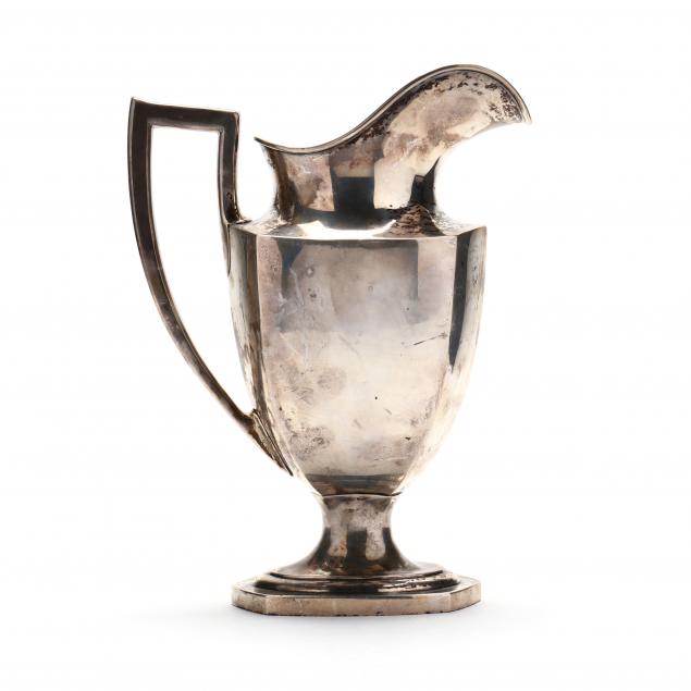 A STERLING SILVER WATER PITCHER 34934e