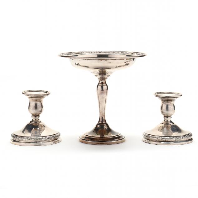A STERLING SILVER COMPOTE AND PAIR