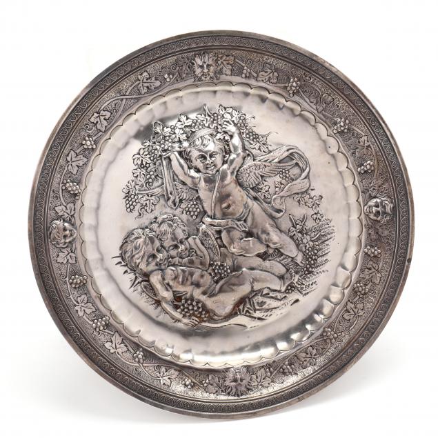 A FRENCH SILVER REPOUSSé FOOTED