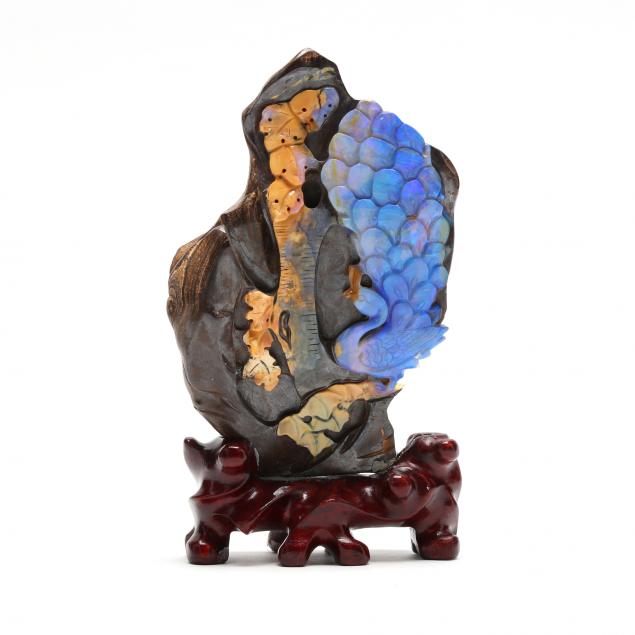 A CHINESE BOULDER OPAL PEACOCK