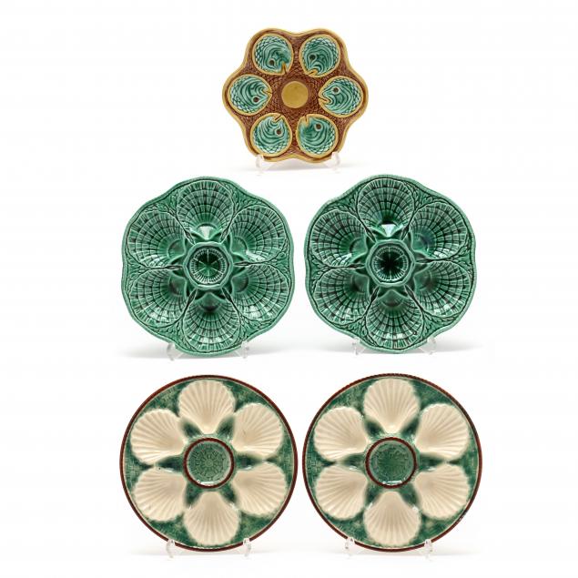 FIVE MAJOLICA OYSTER PLATES Two
