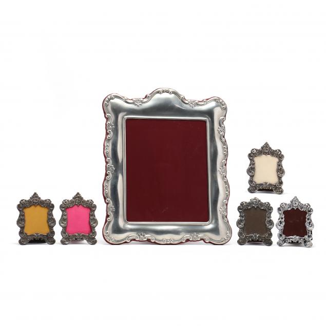 SIX SILVER AND PEWTER PICTURE FRAMES