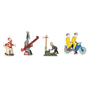 Six Tin Clown and Circus Toys
20th