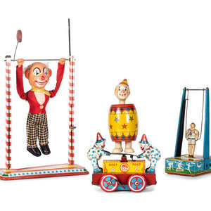 Four Tin Circus and Clown Toys
American,