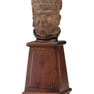 A Chinese Bronze Head of a Priest
on