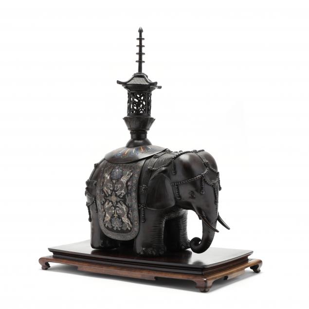 AN ASIAN BRONZE CHAMPLEVE ELEPHANT