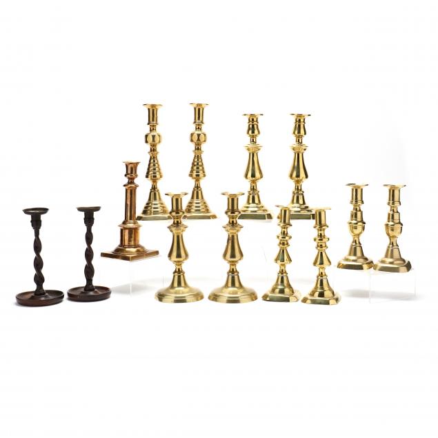 A COLLECTION OF ANTIQUE ENGLISH CANDLESTICKS