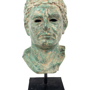 A Patinated Metal Portrait Head
After