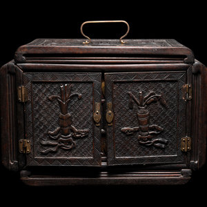 A Chinese Carved Rosewood Chest
of rectangular