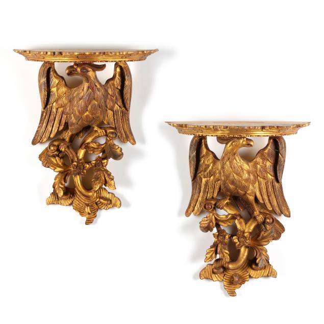 A PAIR OF CARVED GILT EAGLE WALL