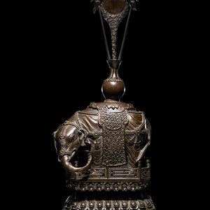 A Chinese Bronze Figure of a Caparisoned