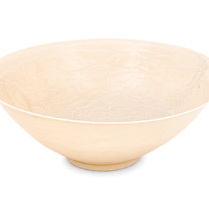 A Japanese White Glazed Molded Bowl
the