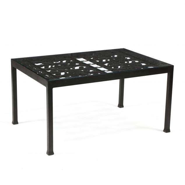 IRON AND GLASS COFFEE TABLE Comprised