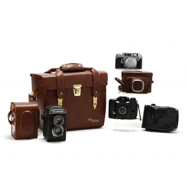 THREE VINTAGE CAMERAS AND ACCESSORIES