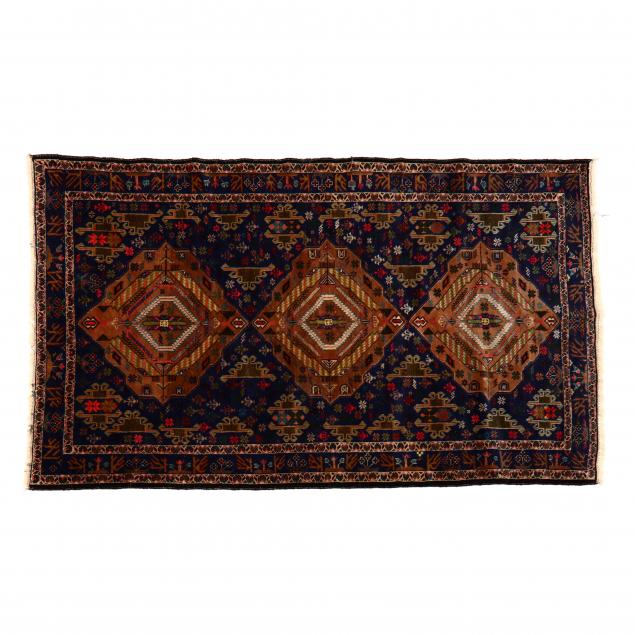 ORIENTAL AREA RUG Field with three tan