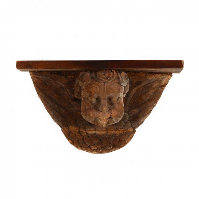 LARGE FOLKY CARVED PUTTO WALL BRACKET