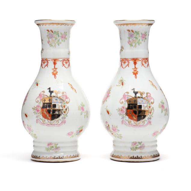 A PAIR OF PORCELAIN ARMORIAL VASES