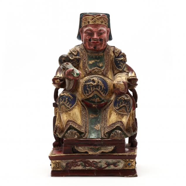 A CHINESE CARVED WOODEN DEITY SCULPTURE 34a0eb