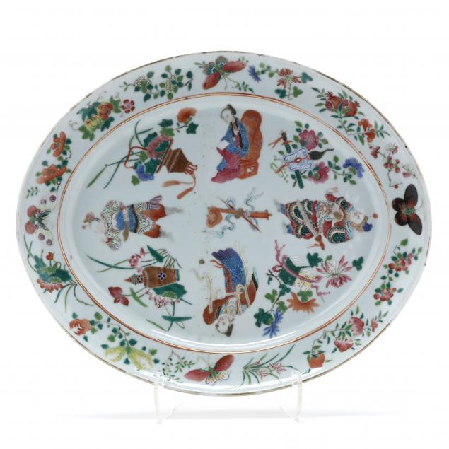 A CHINESE EXPORT FAMILLE ROSE OVAL PLATTER