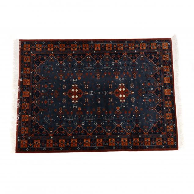 WOOL CARPET Blue field with two rust