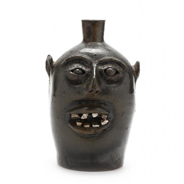 NC FOLK POTTERY FACE JUG, BROWNS