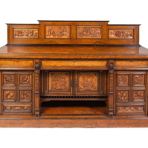 A Continental Carved Walnut and