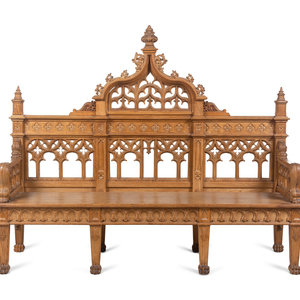 A Gothic Revival Carved Oak Hall