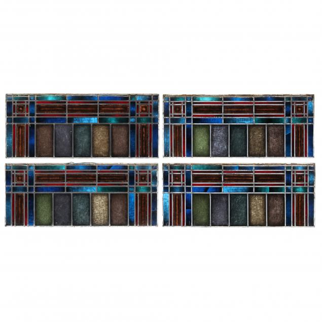 FOUR ARCHITECTURALLY SALVAGED STAINED