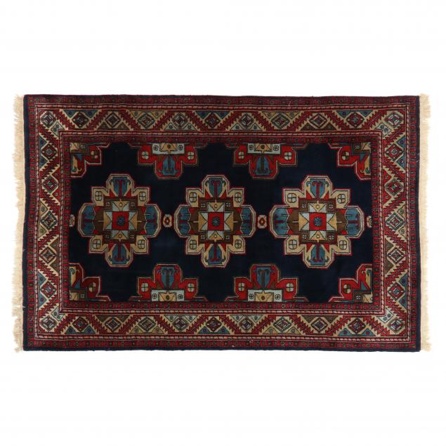 AFGHAN AREA RUG In a Caucasian