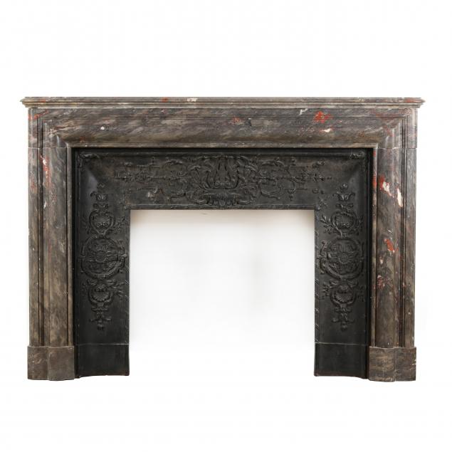 ANTIQUE IRON FIREPLACE SURROUND AND