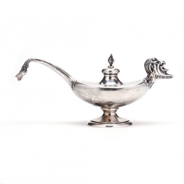 AN ANTIQUE STERLING SILVER ALADDIN