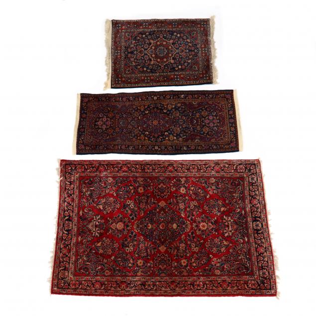 THREE PERSIAN AREA RUGS The first