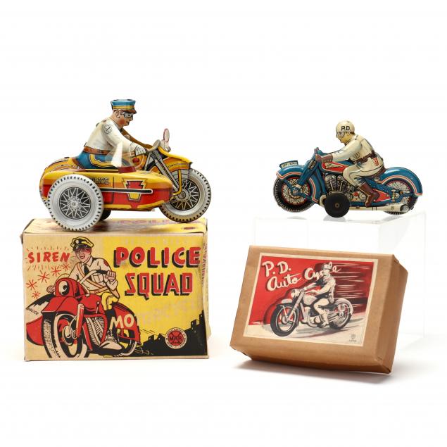 TWO VINTAGE BOXED POLICE CYCLE 348913