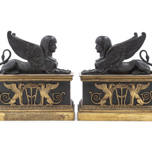 A Pair of Empire Gilt and Patinated