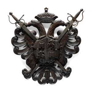 A Continental Carved Walnut Coat-of-Arms