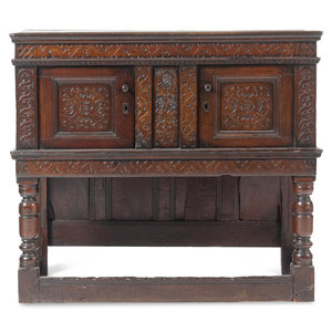 A Jacobean Carved Oak Court Cupboard
17th