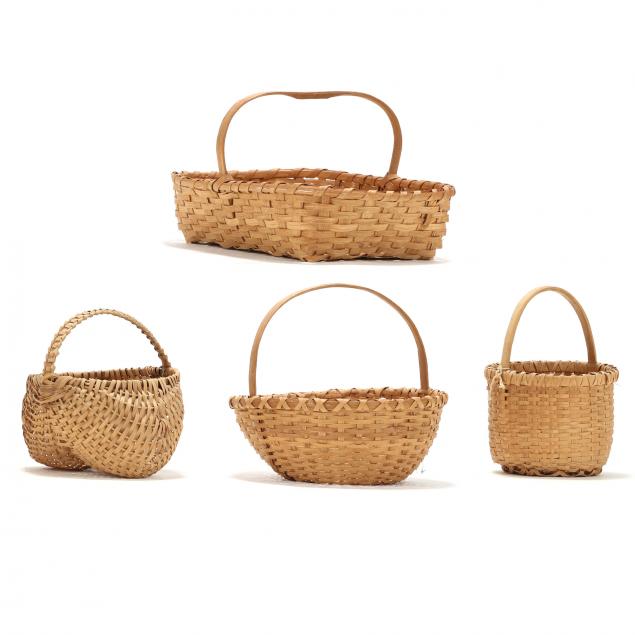 A GROUP OF FOUR CONTEMPORARY BASKETS
