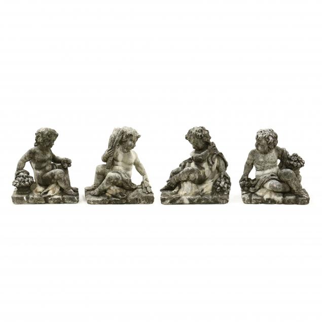 FOUR CAST STONE GARDEN STATUES 348c3a