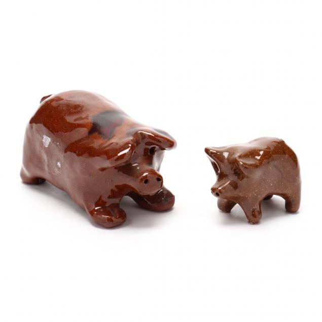 NC FOLK POTTERY TWO MOLDED PIGS  34b54f