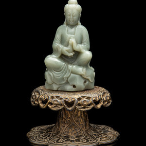 A Chinese Celadon Jade Figure of